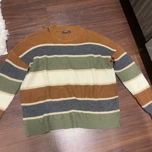 Fall colored sweater.